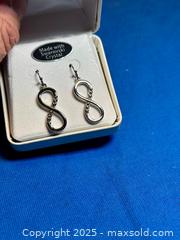 MaxSold Auction: Infinity Loop Earrings Made With Swarovski Crystals - Hamilton (Ontario, Canada) SELLER MANAGED Estate Sale Online Auction - Gertrude Street