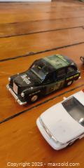 MaxSold Auction: 11 Vintage Die-Cast Cars – Police Cruisers, The Beatles Taxi, Tonka Van & More  - Toronto (Ontario, Canada) SELLER MANAGED Moving Online Auction - 1/2  Wellesley Street East