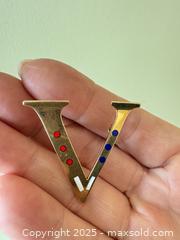 MaxSold Auction: 14K Gold Modernist “V” Brooch with Enamel Accents – Marked 14K - Toronto (Ontario, Canada) SELLER MANAGED Moving Online Auction - 1/2  Wellesley Street East