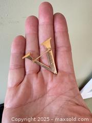 MaxSold Auction: 14K Gold Modernist “V” Brooch with Enamel Accents – Marked 14K - Toronto (Ontario, Canada) SELLER MANAGED Moving Online Auction - 1/2  Wellesley Street East