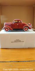 MaxSold Auction: 1936 Ford Deluxe 5-Window Coupe Diecast Model (Red) – Opening Hood & Doors, Detailed Inter - Toronto (Ontario, Canada) SELLER MANAGED Moving Online Auction - 1/2  Wellesley Street East