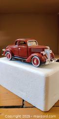 MaxSold Auction: 1936 Ford Deluxe 5-Window Coupe Diecast Model (Red) – Opening Hood & Doors, Detailed Inter - Toronto (Ontario, Canada) SELLER MANAGED Moving Online Auction - 1/2  Wellesley Street East
