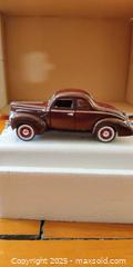 MaxSold Auction: 1940 Ford Deluxe Coupe Die-Cast Model – Burgundy, Detailed Interior/Engine - Toronto (Ontario, Canada) SELLER MANAGED Moving Online Auction - 1/2  Wellesley Street East