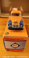 MaxSold Auction: 1955 Diamond-T Stake Truck Die-Cast Model by AC – 1:34 Scale with Parts Boxes & Original B - Toronto (Ontario, Canada) SELLER MANAGED Moving Online Auction - 1/2  Wellesley Street East