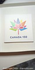 MaxSold Auction: 2017 Canada 150 Commemorative Silver Dollar in Presentation Folder  - Toronto (Ontario, Canada) SELLER MANAGED Moving Online Auction - 1/2  Wellesley Street East