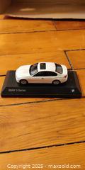 MaxSold Auction: 24 BMW 3 Series Diecast Model Car on Display Base – Opening Hood & Trunk  - Toronto (Ontario, Canada) SELLER MANAGED Moving Online Auction - 1/2  Wellesley Street East
