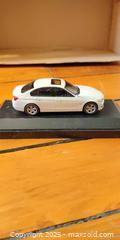 MaxSold Auction: 24 BMW 3 Series Diecast Model Car on Display Base – Opening Hood & Trunk  - Toronto (Ontario, Canada) SELLER MANAGED Moving Online Auction - 1/2  Wellesley Street East