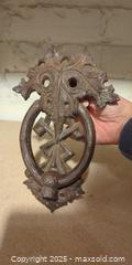 MaxSold Auction: Antique Cast-Iron Decorative Door Knocker - Toronto (Ontario, Canada) SELLER MANAGED Moving Online Auction - 1/2  Wellesley Street East