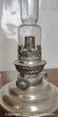MaxSold Auction: Antique French Pewter Oil Lamp with Glass Chimneys – “Le Sphinx Breveté, Louis Brandt”  - Toronto (Ontario, Canada) SELLER MANAGED Moving Online Auction - 1/2  Wellesley Street East