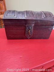 MaxSold Auction: Antique Leather-Covered Domed Trunk / Chest with Tooled Decoration, c. 1880–1920 - Toronto (Ontario, Canada) SELLER MANAGED Moving Online Auction - 1/2  Wellesley Street East