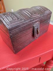 MaxSold Auction: Antique Leather-Covered Domed Trunk / Chest with Tooled Decoration, c. 1880–1920 - Toronto (Ontario, Canada) SELLER MANAGED Moving Online Auction - 1/2  Wellesley Street East