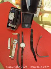 MaxSold Auction: Assorted Wristwatch Collection with Extra Bands & Storage Cases - Toronto (Ontario, Canada) SELLER MANAGED Moving Online Auction - 1/2  Wellesley Street East