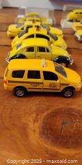 MaxSold Auction: Collection of 17 Yellow Taxi Die-Cast Cars – Assorted Makes & Styles  - Toronto (Ontario, Canada) SELLER MANAGED Moving Online Auction - 1/2  Wellesley Street East
