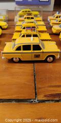MaxSold Auction: Collection of 17 Yellow Taxi Die-Cast Cars – Assorted Makes & Styles  - Toronto (Ontario, Canada) SELLER MANAGED Moving Online Auction - 1/2  Wellesley Street East