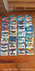 MaxSold Auction: Collection of 24 Hot Wheels – Factory Fresh, HW Trucks, Premieres & Special Editions – New - Toronto (Ontario, Canada) SELLER MANAGED Moving Online Auction - 1/2  Wellesley Street East