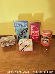 MaxSold Auction: Collection of Vintage Advertising Tins Including Jacob & Co. Cream Crackers and Biscuit Ti - Toronto (Ontario, Canada) SELLER MANAGED Moving Online Auction - 1/2  Wellesley Street East