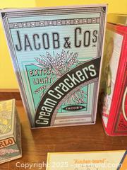 MaxSold Auction: Collection of Vintage Advertising Tins Including Jacob & Co. Cream Crackers and Biscuit Ti - Toronto (Ontario, Canada) SELLER MANAGED Moving Online Auction - 1/2  Wellesley Street East