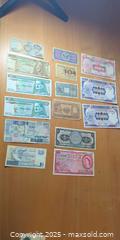 MaxSold Auction: Collection of Vintage World Banknotes – Guatemala, Uganda, Singapore & More  - Toronto (Ontario, Canada) SELLER MANAGED Moving Online Auction - 1/2  Wellesley Street East