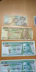 MaxSold Auction: Collection of Vintage World Banknotes – Guatemala, Uganda, Singapore & More  - Toronto (Ontario, Canada) SELLER MANAGED Moving Online Auction - 1/2  Wellesley Street East