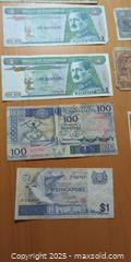 MaxSold Auction: Collection of Vintage World Banknotes – Guatemala, Uganda, Singapore & More  - Toronto (Ontario, Canada) SELLER MANAGED Moving Online Auction - 1/2  Wellesley Street East
