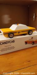 MaxSold Auction: Four Toy Cars – Candylab Wooden “CandyCab,” LEGO Speed Champions Set, Black Race Car, and  - Toronto (Ontario, Canada) SELLER MANAGED Moving Online Auction - 1/2  Wellesley Street East