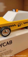 MaxSold Auction: Four Toy Cars – Candylab Wooden “CandyCab,” LEGO Speed Champions Set, Black Race Car, and  - Toronto (Ontario, Canada) SELLER MANAGED Moving Online Auction - 1/2  Wellesley Street East