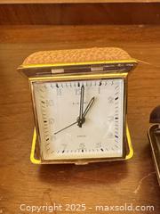 MaxSold Auction: Group of 4 Vintage Travel Alarm Clocks – Quartz & Mechanical Styles  - Toronto (Ontario, Canada) SELLER MANAGED Moving Online Auction - 1/2  Wellesley Street East