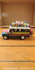 MaxSold Auction: Hand-Painted Folk Art Bus Figurine with Miniature Passengers & Roof Cargo - Toronto (Ontario, Canada) SELLER MANAGED Moving Online Auction - 1/2  Wellesley Street East