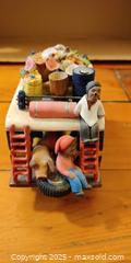MaxSold Auction: Hand-Painted Folk Art Bus Figurine with Miniature Passengers & Roof Cargo - Toronto (Ontario, Canada) SELLER MANAGED Moving Online Auction - 1/2  Wellesley Street East
