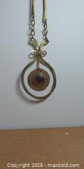 MaxSold Auction: Handcrafted Artisan Necklace by Rafael (Canada) – Brass Pendant with Amber-Tone Cabochon - Toronto (Ontario, Canada) SELLER MANAGED Moving Online Auction - 1/2  Wellesley Street East
