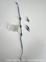 MaxSold Auction: Handcrafted Blue Glass & Silver Bead Necklace with Matching Earrings – African-Inspired De - Toronto (Ontario, Canada) SELLER MANAGED Moving Online Auction - 1/2  Wellesley Street East