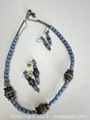 MaxSold Auction: Handcrafted Blue Glass & Silver Bead Necklace with Matching Earrings – African-Inspired De - Toronto (Ontario, Canada) SELLER MANAGED Moving Online Auction - 1/2  Wellesley Street East