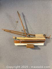 MaxSold Auction: Handcrafted Wooden Sailboat Model with Rigging – Named “PATE”  - Toronto (Ontario, Canada) SELLER MANAGED Moving Online Auction - 1/2  Wellesley Street East
