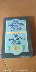 MaxSold Auction: Hardcover Novel – The Paradise Eater by John Ralston Saul (Inscribed Gift Copy) - Toronto (Ontario, Canada) SELLER MANAGED Moving Online Auction - 1/2  Wellesley Street East