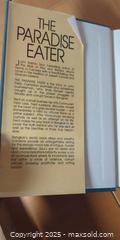 MaxSold Auction: Hardcover Novel – The Paradise Eater by John Ralston Saul (Inscribed Gift Copy) - Toronto (Ontario, Canada) SELLER MANAGED Moving Online Auction - 1/2  Wellesley Street East