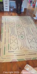 MaxSold Auction: Large Geometric Flatweave Area Rug – Pastel Tribal Pattern (110” × 69”)  - Toronto (Ontario, Canada) SELLER MANAGED Moving Online Auction - 1/2  Wellesley Street East