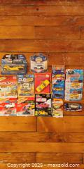 MaxSold Auction: Lot of 15 Die-Cast Vehicles — Matchbox, Johnny Lightning, Maisto, Jada, NYC Taxis & More — - Toronto (Ontario, Canada) SELLER MANAGED Moving Online Auction - 1/2  Wellesley Street East