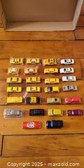 MaxSold Auction: Lot of 26 Die-Cast Vehicles – Taxis, Police Cars, Vintage & Mixed Models - Toronto (Ontario, Canada) SELLER MANAGED Moving Online Auction - 1/2  Wellesley Street East