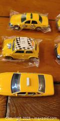 MaxSold Auction: Lot of 26 Die-Cast Vehicles – Taxis, Police Cars, Vintage & Mixed Models - Toronto (Ontario, Canada) SELLER MANAGED Moving Online Auction - 1/2  Wellesley Street East