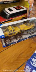 MaxSold Auction: Lot of 3 Toy Vehicles – Road Rippers Motorized Ford Flex, 4×4 Jeep with Trailer, XRacer Ra - Toronto (Ontario, Canada) SELLER MANAGED Moving Online Auction - 1/2  Wellesley Street East