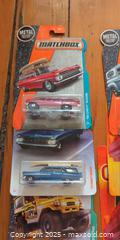 MaxSold Auction: Lot of Sealed Matchbox Die-Cast Vehicles – 14 New in Package  - Toronto (Ontario, Canada) SELLER MANAGED Moving Online Auction - 1/2  Wellesley Street East