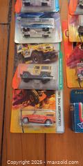 MaxSold Auction: Lot of Sealed Matchbox Die-Cast Vehicles – 14 New in Package  - Toronto (Ontario, Canada) SELLER MANAGED Moving Online Auction - 1/2  Wellesley Street East
