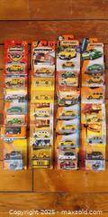MaxSold Auction: Matchbox Taxi Collection – Lot of 26 New-In-Package Die-Cast Taxis - Toronto (Ontario, Canada) SELLER MANAGED Moving Online Auction - 1/2  Wellesley Street East