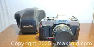 MaxSold Auction: Minolta XG-1 35mm SLR Film Camera with Lens and Original Case  - Toronto (Ontario, Canada) SELLER MANAGED Moving Online Auction - 1/2  Wellesley Street East