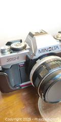 MaxSold Auction: Minolta XG-1 35mm SLR Film Camera with Lens and Original Case  - Toronto (Ontario, Canada) SELLER MANAGED Moving Online Auction - 1/2  Wellesley Street East