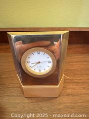 MaxSold Auction: Modern Sculptural Brass-Tone Quartz Desk Clock with Roman Numerals - Toronto (Ontario, Canada) SELLER MANAGED Moving Online Auction - 1/2  Wellesley Street East
