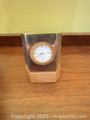MaxSold Auction: Modern Sculptural Brass-Tone Quartz Desk Clock with Roman Numerals - Toronto (Ontario, Canada) SELLER MANAGED Moving Online Auction - 1/2  Wellesley Street East