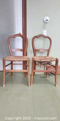 MaxSold Auction: Pair of Vintage Balloon Back Wooden Chairs with Rush Seats – One Damaged - Toronto (Ontario, Canada) SELLER MANAGED Moving Online Auction - 1/2  Wellesley Street East