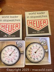 MaxSold Auction: Pair of Vintage Heuer Swiss Stopwatches with Original Boxes (2)  - Toronto (Ontario, Canada) SELLER MANAGED Moving Online Auction - 1/2  Wellesley Street East