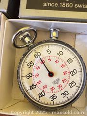 MaxSold Auction: Pair of Vintage Heuer Swiss Stopwatches with Original Boxes (2)  - Toronto (Ontario, Canada) SELLER MANAGED Moving Online Auction - 1/2  Wellesley Street East